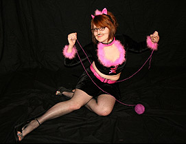 cute costume cat girl plays with a ball of  yarn, naked cosplay cat girl ready to yiff